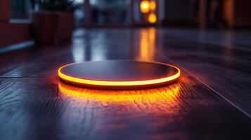 A glowing object on a table with a person in the background photo