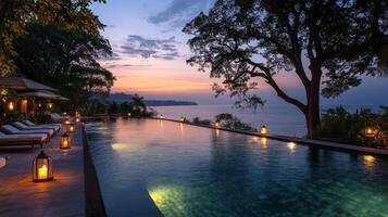 The pool at the beach club at sunset photo