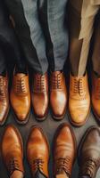 A group of men's shoes in a row photo