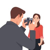 Capturing the Moment. Man takes a photo of a smiling woman posing in front of him with a camera. vector