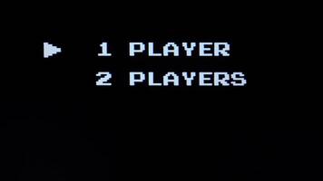 8 bit retro vintage game menu with player options. choose player video