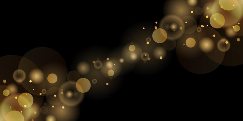 Abstract shiny bokeh gold glitter on isolated black background. Abstract shiny gold glitter sparkles bokeh background