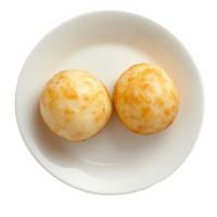 Two fried balls of dough sit on a white plate png