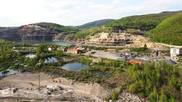 Aerial Flight over the quarry of sand and stone. An existing quarry where minerals are mined. video