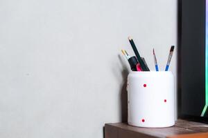 Art Supplies in a Polka Dot Pot photo