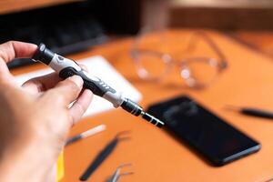 Precision Screwdriver in a Workspace photo
