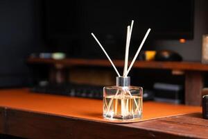 Stylish Glass Diffuser on a Wooden Desk photo