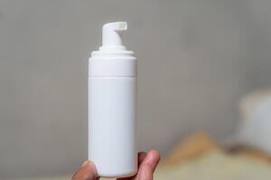 White Pump Bottle in Hand photo