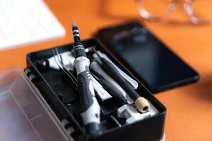 A black case with a set of tools in it photo