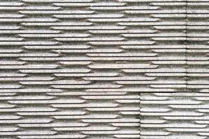 Textured Stone Wall with Grooves photo