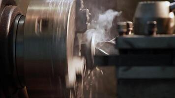 lathe spindle rotating, metal processing, close-up, loop video