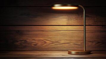 A lamp on a wooden table in front of a wall photo