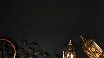 Two Shining Islamic Lanterns And Dates On Wooden Plate photo