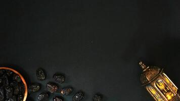 Shining Islamic Lantern And A Plate Of Dates photo