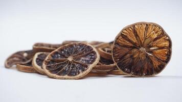 Dried Lemon Slices on White Background photo