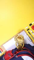 School Stationery, Backpack, and Wooden Clip Board with Copy Space Area photo