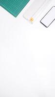 Office Supplies with Mobile Phone on White Background photo