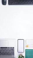 Workspace with Office Supplies on White Background photo