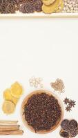 Various Spices on Light Background with Copy Space photo
