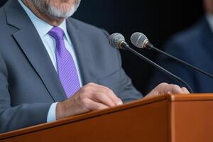 Close-up of a speaker making a speech at a conference. photo