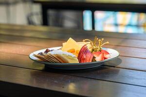 A plate of food on a table photo