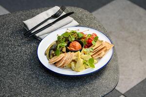 A plate of food on a table photo
