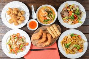 A table with several plates of food on it photo