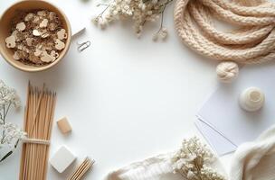 Crafting materials and floral accents in a serene workspace with a cozy atmosphere photo