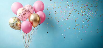 Colorful balloons and confetti create festive atmosphere for celebration photo
