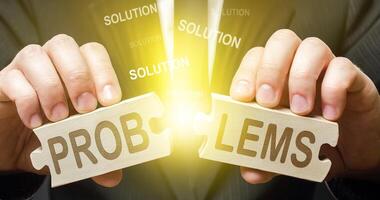 A man solves problems and finds solutions. Dispute solution, compromise consensus. Win-win. Correction and work on errors, gaining valuable experience. Good optimistic changes. Overcome trouble. photo