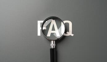 FAQ and magnifying glass. Frequently asked questions. Topic navigation. Simplify complexities, find answers, and make informed decisions photo