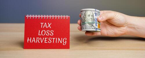 Notes with the Tax loss harvesting. Timely selling of securities at a loss to offset the amount photo