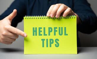 Helpful tips on notes in male hands. Business concept. Strategy, plan, planning. useful tips photo