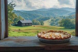 Apple pie cooling on window sill overlooking appalachian mountain valley farm photo
