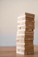 A stack of wooden blocks on a table photo