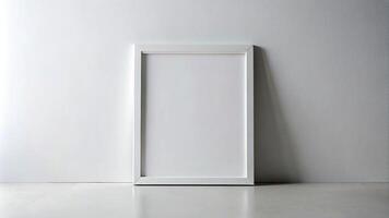 The white frame is leaning against the wall photo
