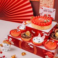 Close up photography of chinese new year tower pie with rabbit character and Chinese poster background photo