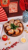 Top View of Chinese New Year Food with Chinese Ornaments Background. photo