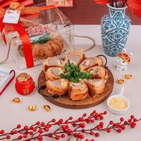 Chinese New Years Sliced Picnic Roll with Chinese Ornaments Background photo