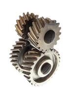 A detailed close-up of three interlocking metal gears, showcasing precision engineering and industrial design. Highlighting the texture and functionality of mechanical components photo