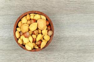 Assorted mixed nuts on white background almond hazelnut walnut photo