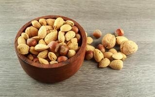 Assorted mixed nuts on white background almond hazelnut walnut photo