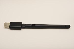 USB Bluetooth Adapter for PC. Wi-Fi router on a white background. photo