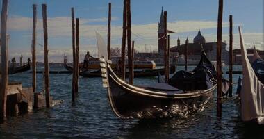 Gondolas Floating By A Dock In Venice video