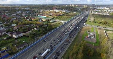 An endless traffic jam on a highway in the middle of a countryside scenery video