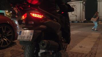 People and transport traffic in night Paris, view with Arc de Triomphe video