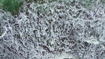 Beach wave from above, top drone view or bird view. waves and sea in atlantic ocean video