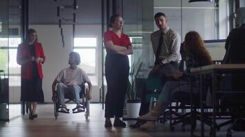 African American businessman in a wheelchair engages in a professional discussion with his colleague, addressing various business challenges and exploring solutions in an inclusive and diverse modern video