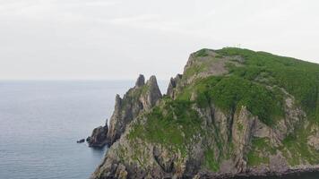Drone view of the rocky cliffs of Cape Vatovskiy video