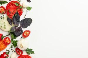 Different herbs and spices on white background, top view photo